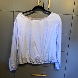 Beautiful blue bubble waist top. Maeve size M